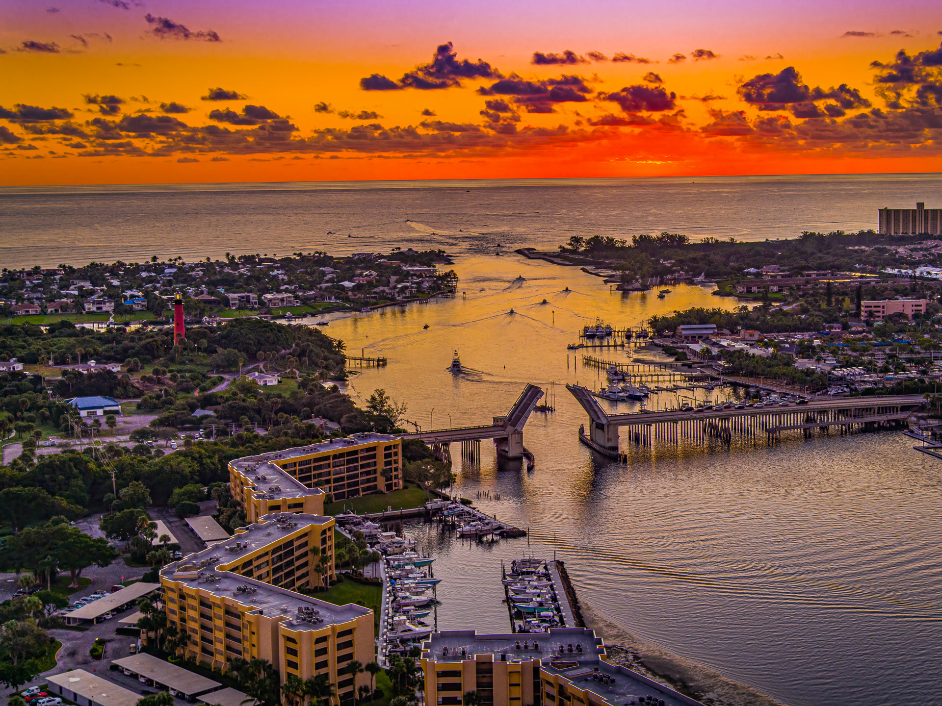 Sunset aerial of the Jupiter Inlet and bridge