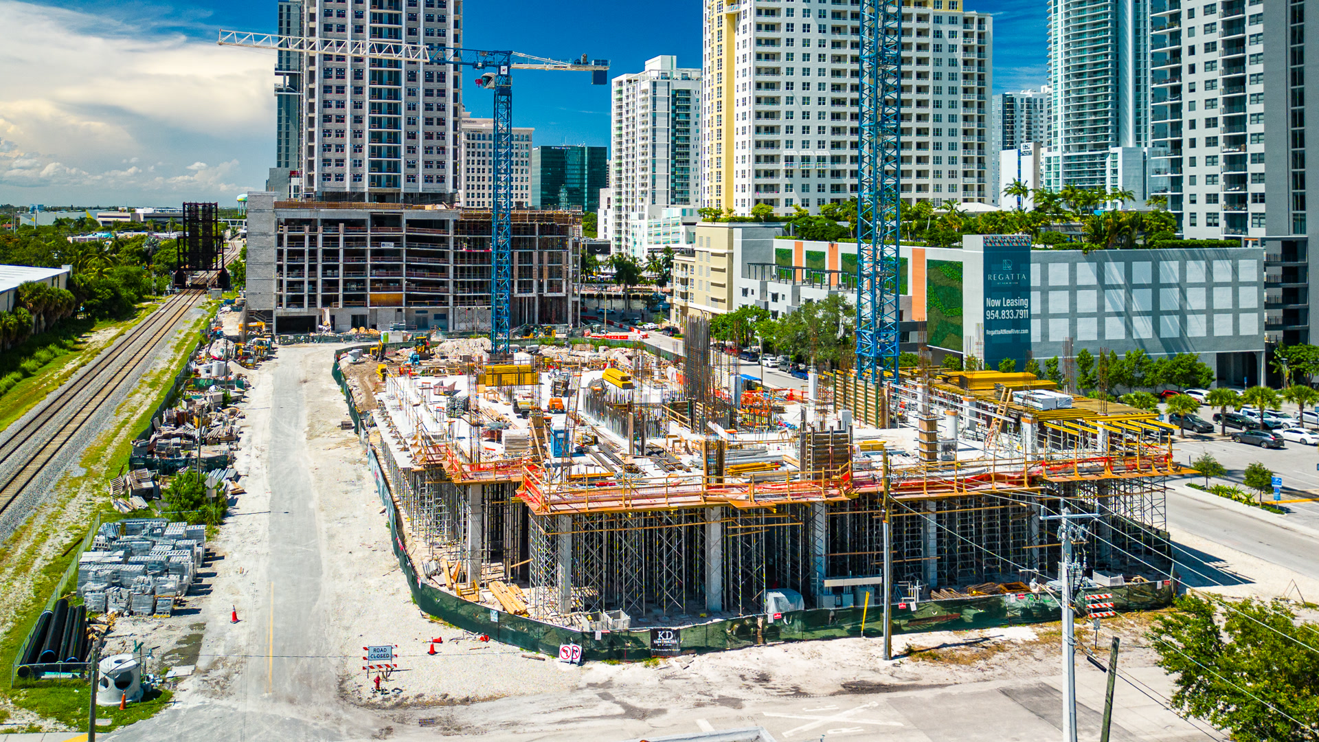 Aerial view of active construction and materials stored across a site