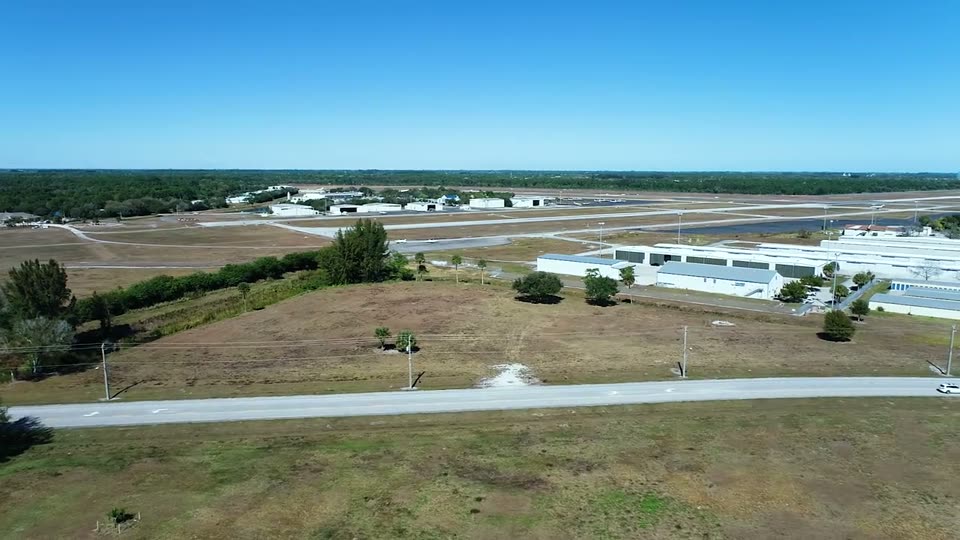 Video: aerial approach over an airport facility